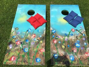 hummingbirds and wildflowers cornhole boards